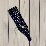 Handmade Buttoned Headbands - Black with White Paw Prints