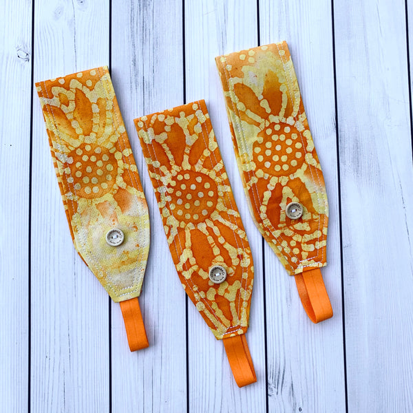 Handmade Buttoned Headbands - Batik Orange/Yellow Sunflowers