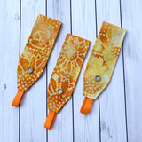 Handmade Buttoned Headbands - Batik Orange/Yellow Sunflowers